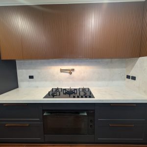 small kitchen design with gas stove inbuilt